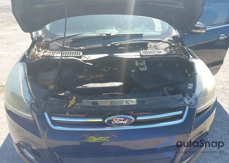 2015 Ford Escape Titanium z USA, uszkodzony, nr VIN 1FMCU0J94FUB56473